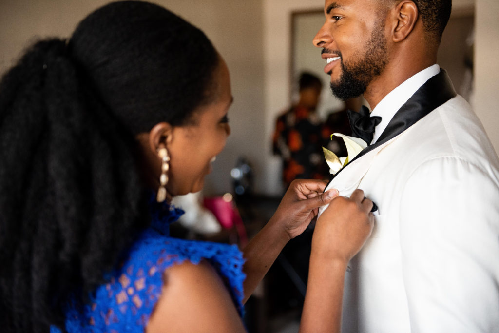 how to pin a boutoniere on a groom maryland wedding planner statuesque events