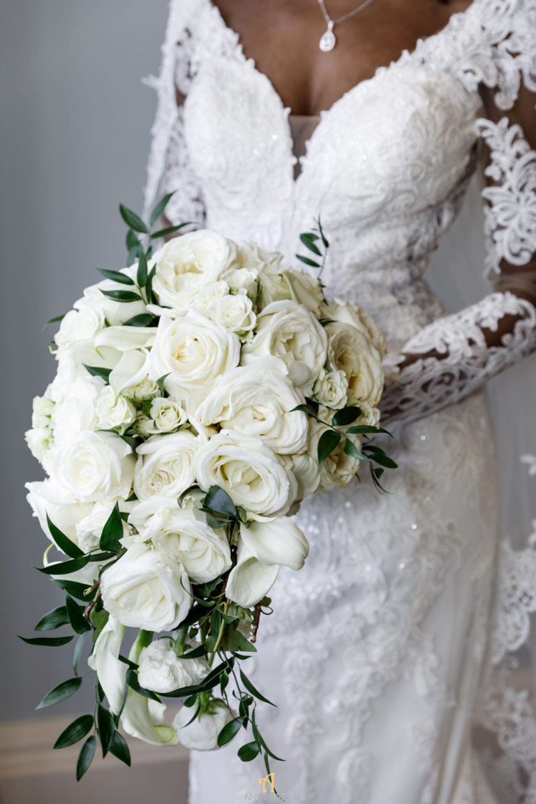 all white bouquet statuesque events