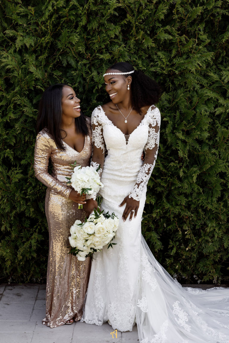 bride and bridesmaids love on wedding day statuesque events