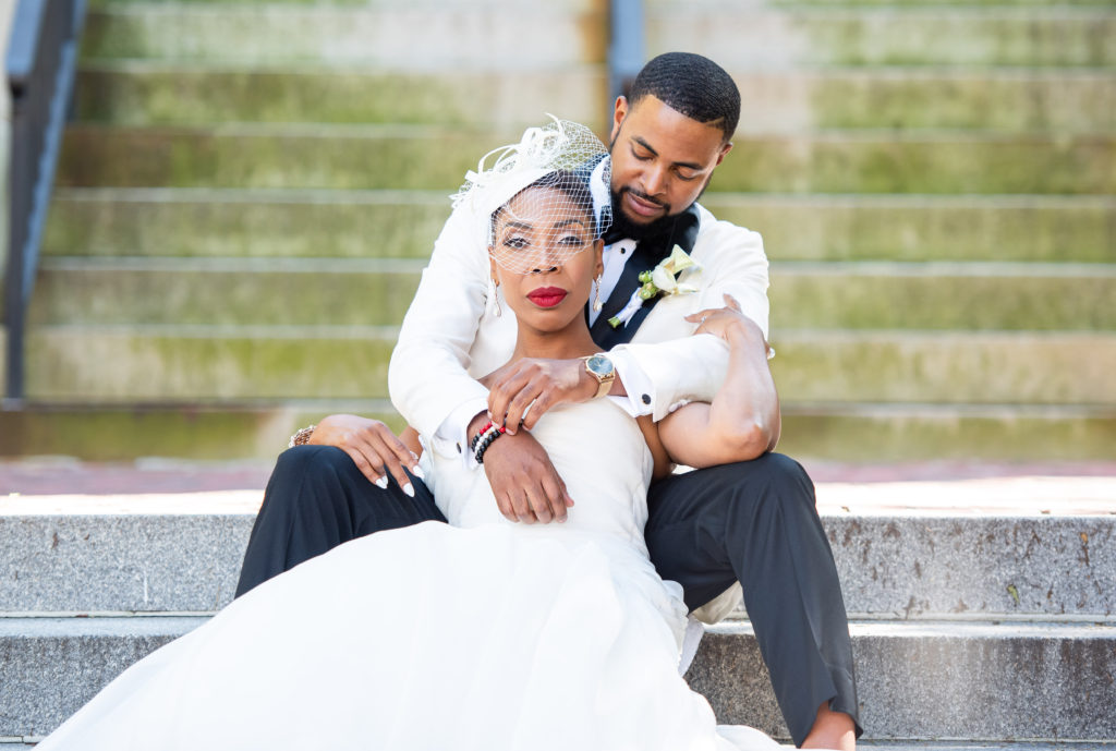 bride and groom on courthouse steps maryland wedding planner statuesque events