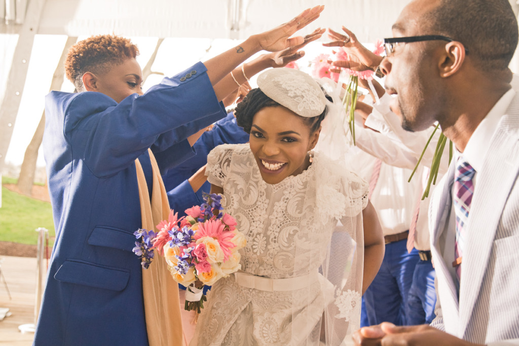 Bridal party switch jacket and bouquet Crystal and Jay wedding Reception at Walker's Overlook by Asa Photography Statuesque Events Wedding Planning