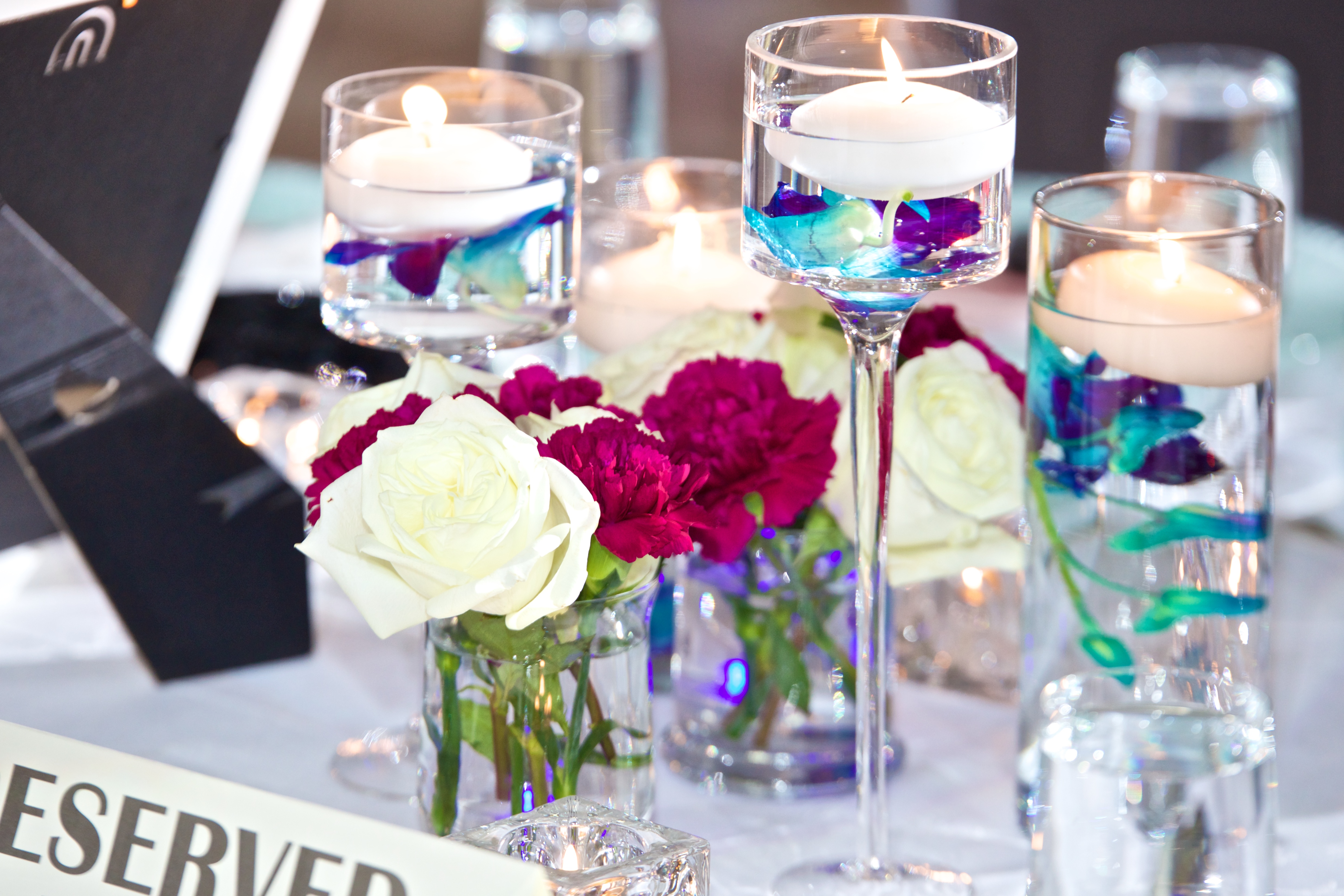 Candles and Carnation Centerpiece JHDC 20th Anniversary Ronald Reagan Building Wedding